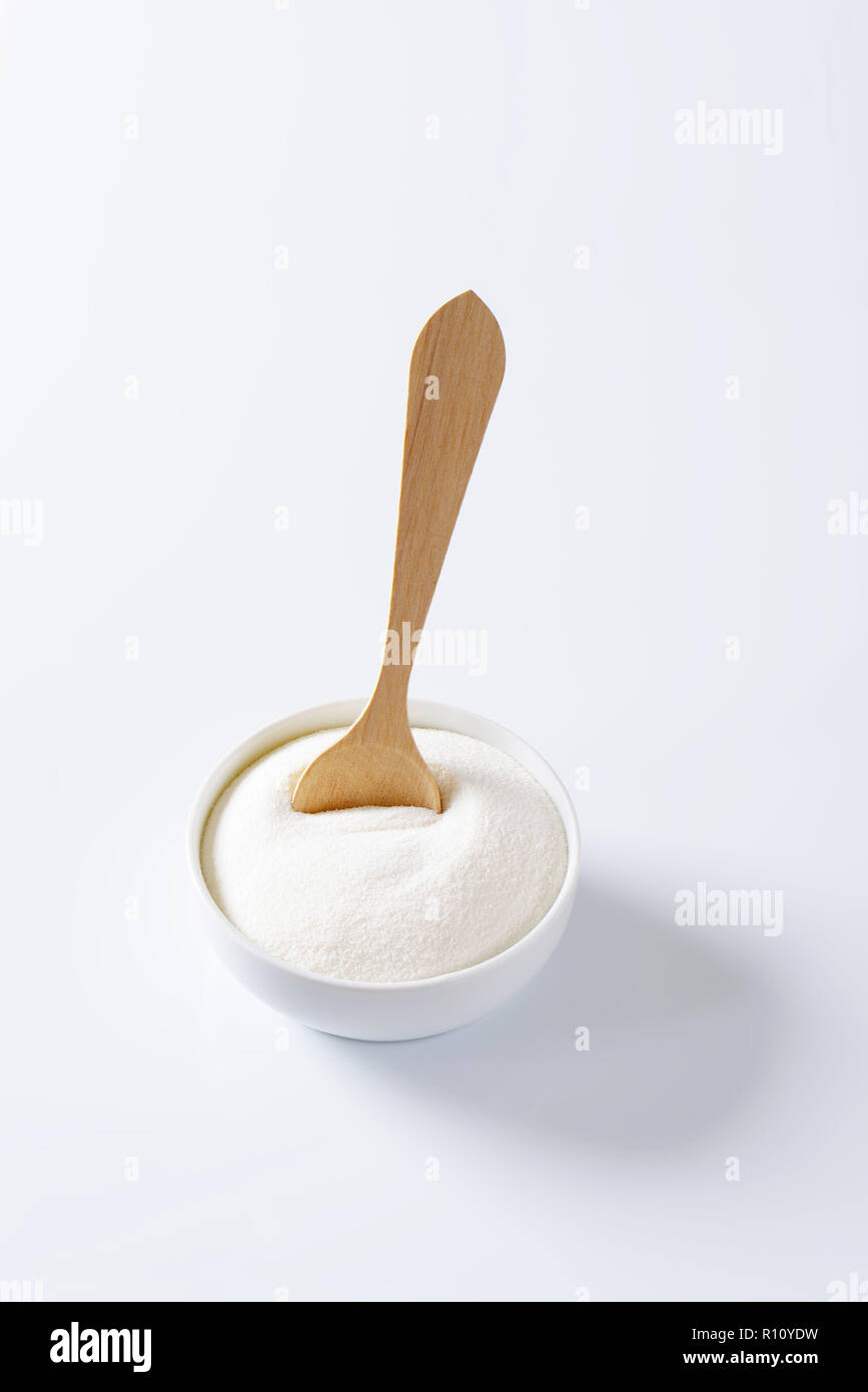 Bowl of full cream powdered milk Stock Photo - Alamy