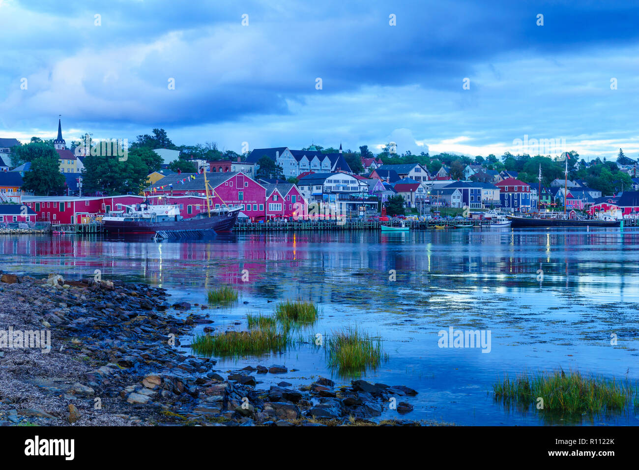 Lunenburg, Canada - September 20, 2018: Sunset view of the waterfront and port of the historic town Lunenburg, Nova Scotia, Canada Stock Photo