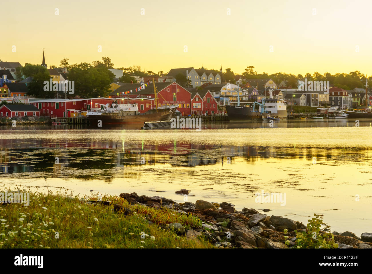Lunenburg, Canada - September 21, 2018: Sunrise view of the waterfront and port of the historic town Lunenburg, Nova Scotia, Canada Stock Photo