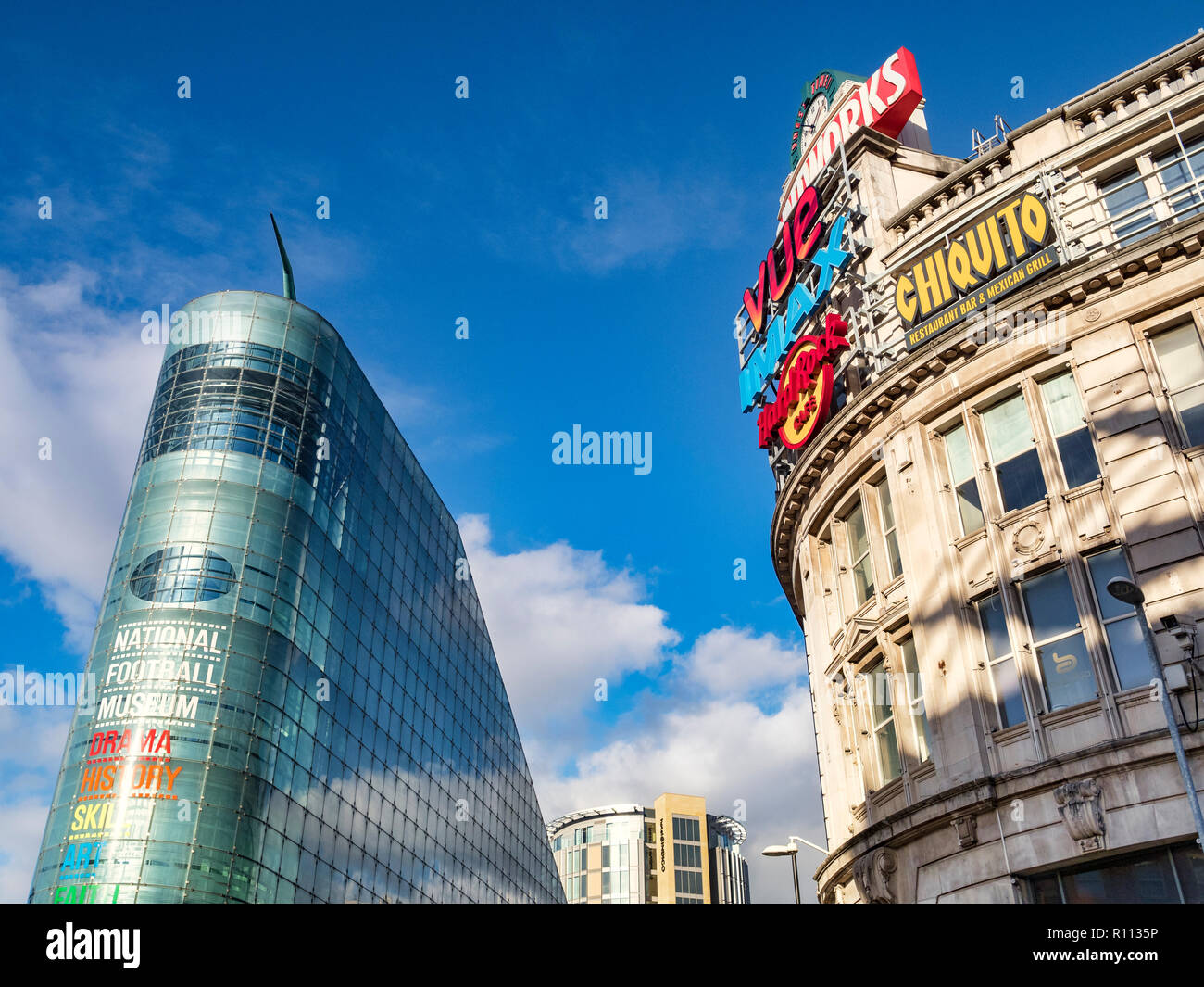 2 November 2018: Manchester, UK -  The Urbis building, home of the National Football Museum, and The Printworks, an entertainment venue, in Exchange S Stock Photo