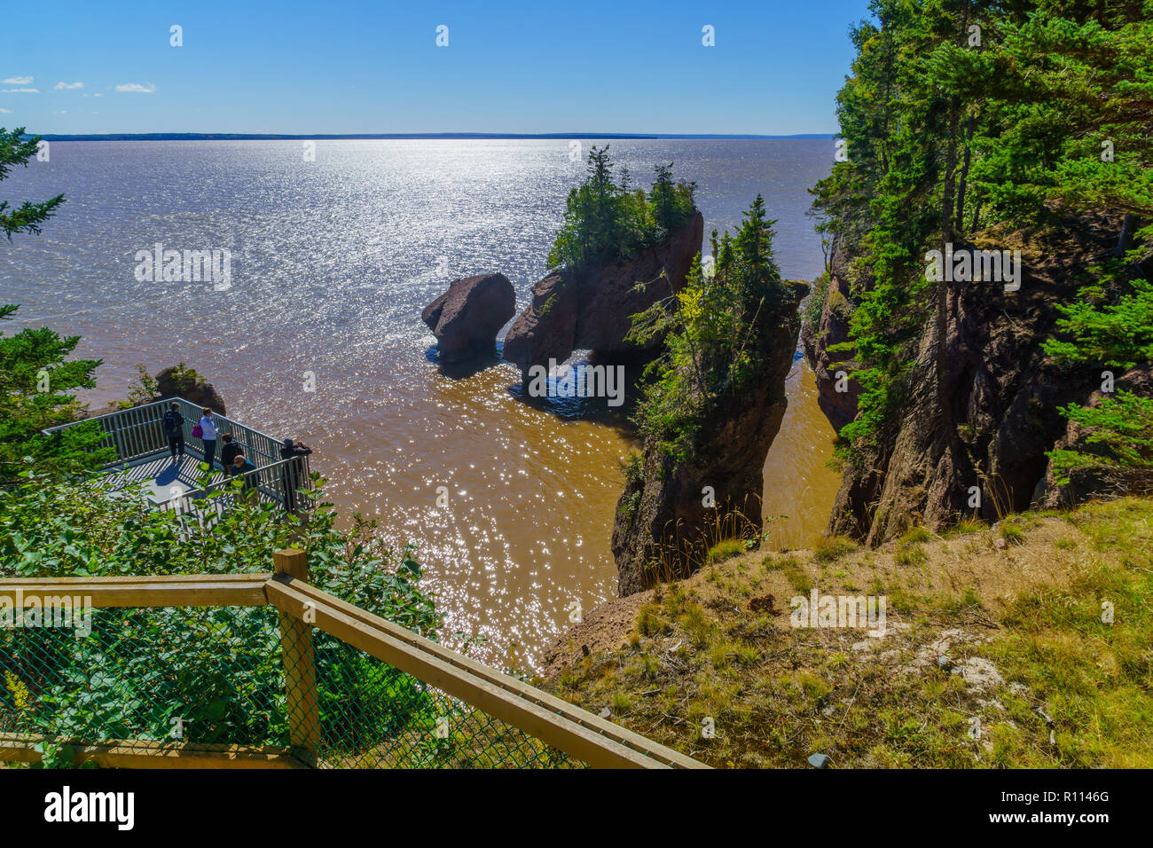 Hopewell Cape, Canada - September 24, 2018: View of Hopewell Rocks at high tide, with visitors. New Brunswick, Canada Stock Photo