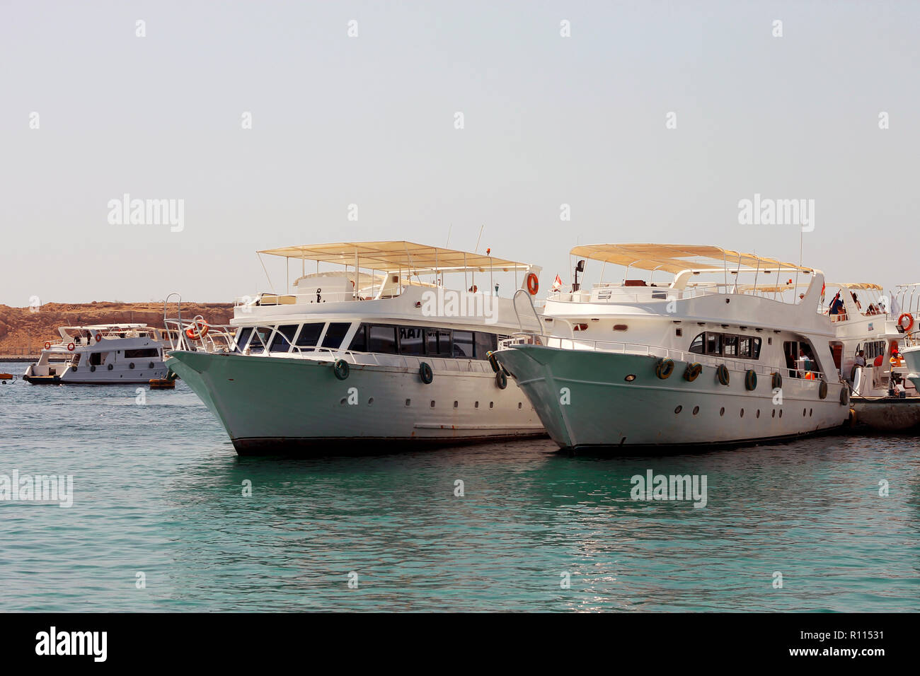 White Ship Moving By The Red Sea Stock Photo - Alamy