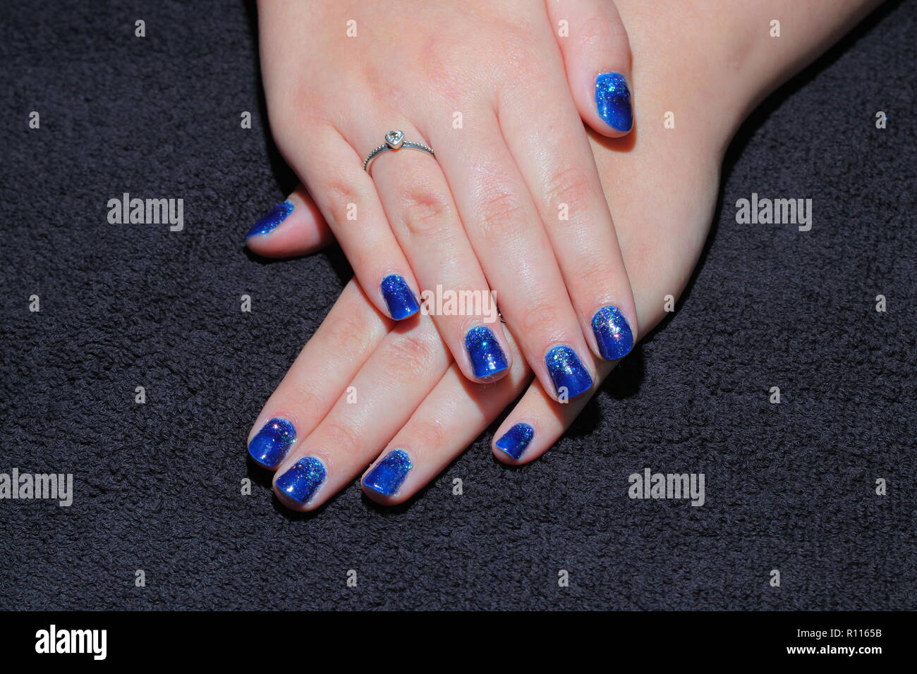 Blue Glittery Finger Nails High Resolution Stock Photography And Images Alamy