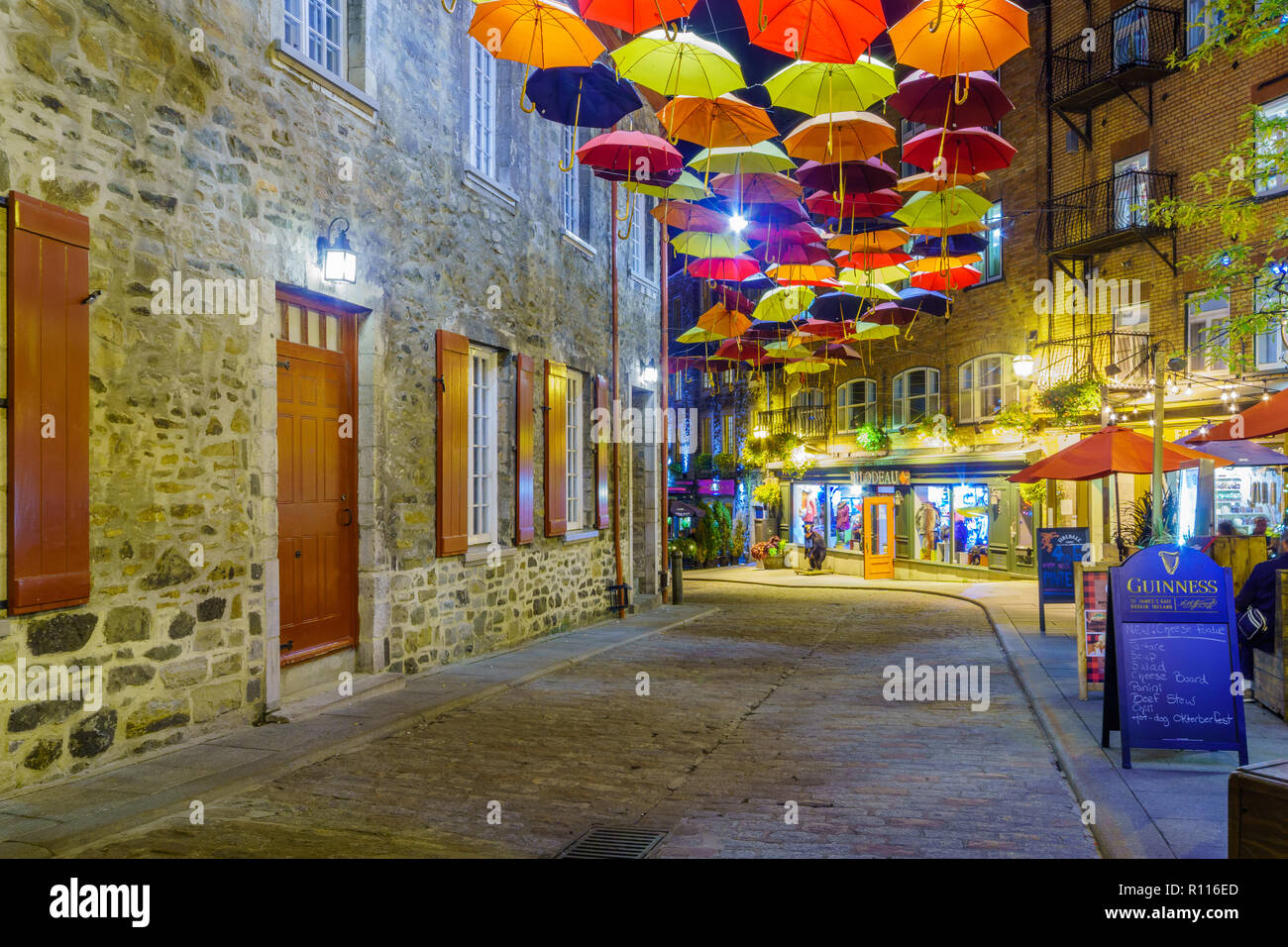 Quebec City, Canada - September 27, 2018: Night view of the Umbrella Alley in the lower town, Quebec City, Quebec, Canada Stock Photo
