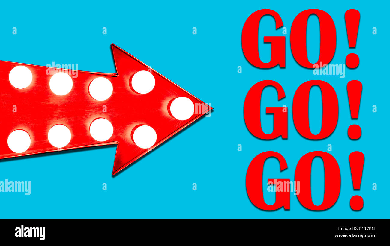 Red arrow shaped vintage colorful illuminated metallic display ...