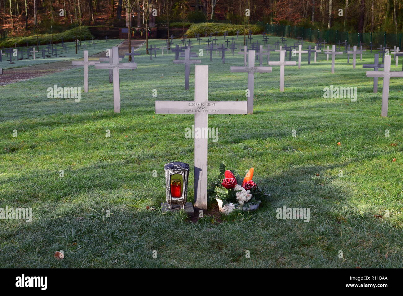 A Grave Marker 30 Nov 1944 Adorned With Flowers At His Last Resting a-grave-marker-30-nov-1944-adorned-with-flowers-at-his-last-resting