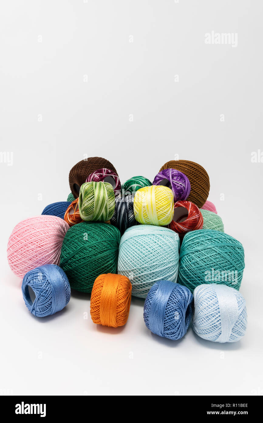 colored threads on the white background Stock Photo