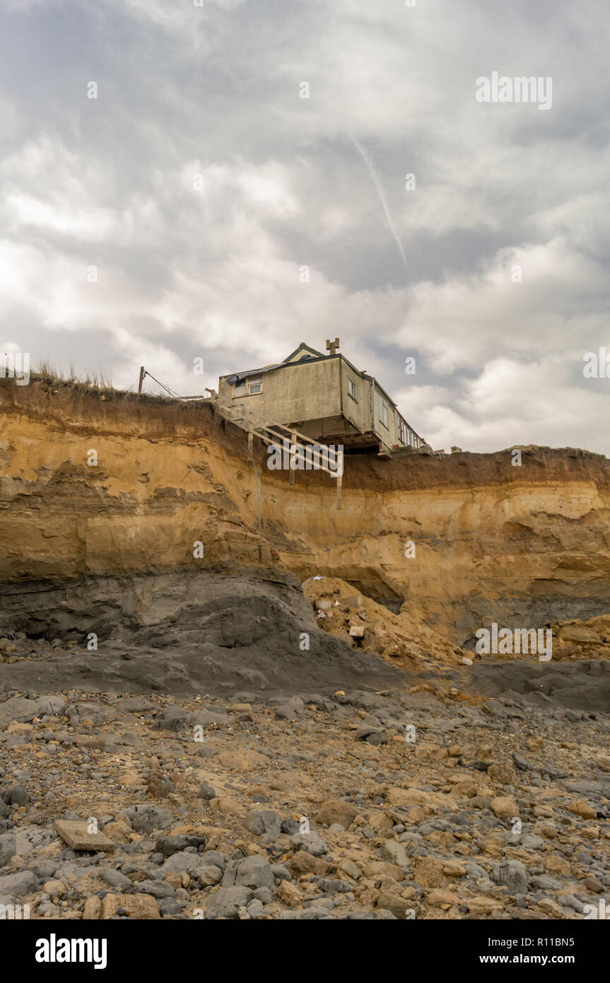 Sea cliff erosion house hi-res stock photography and images - Alamy