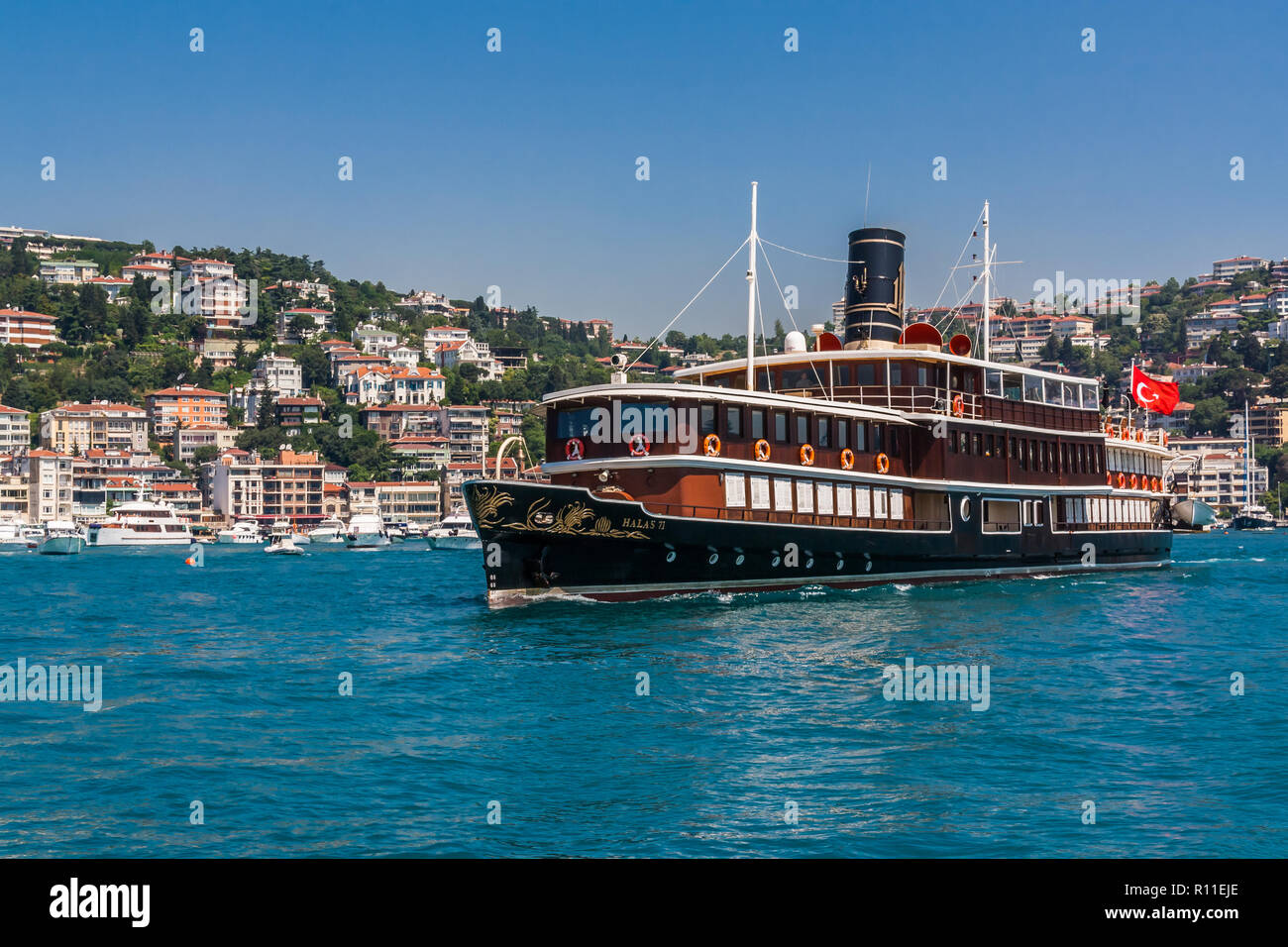 Istanbul, Turkey, June 12, 2012: Halas 71, a luxury cruiser for hire on the Bosporus. Stock Photo