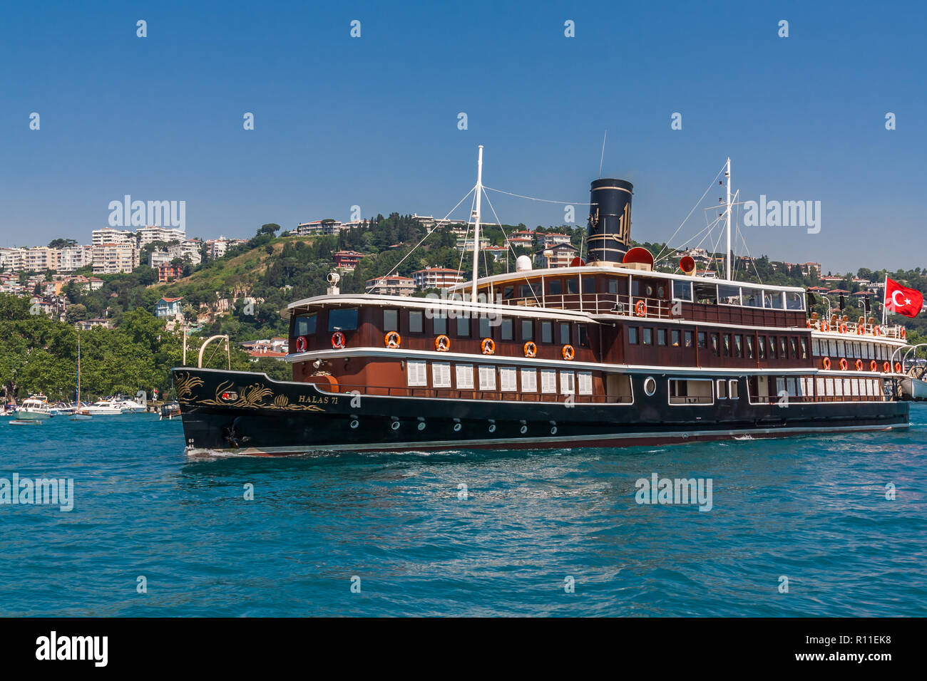 Istanbul, Turkey, June 12, 2012: Halas 71, a luxury cruiser for hire on the Bosporus. Stock Photo