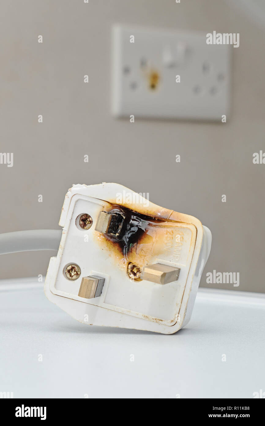 Burned electrical socket hires stock photography and images Alamy