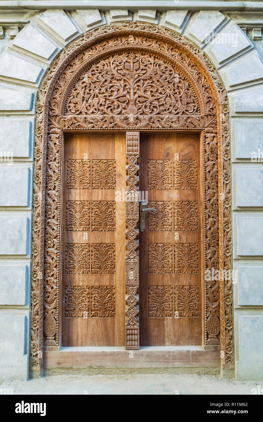 Carved wooden doors of stone town Stock Photo - Alamy