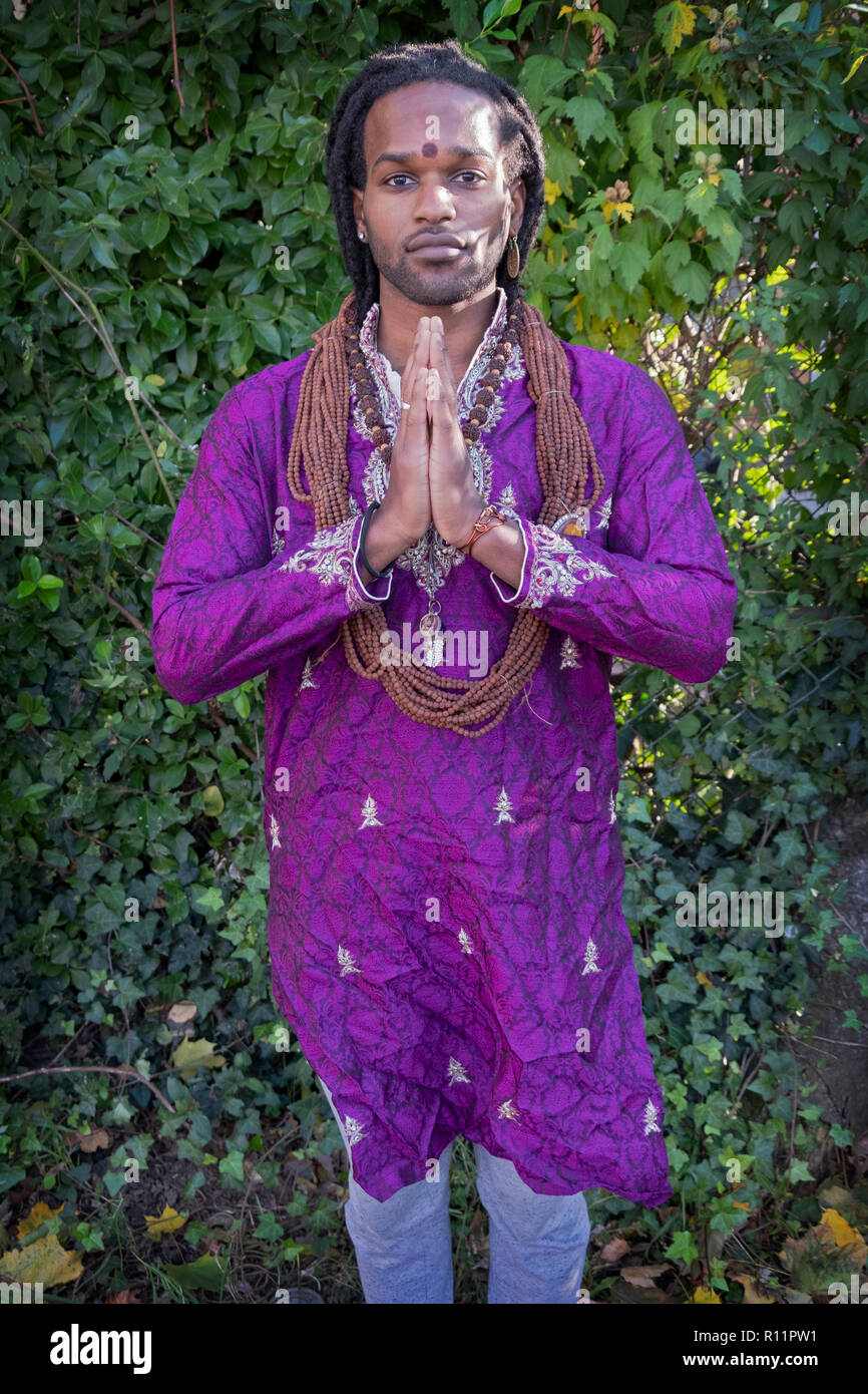 Posed portrait of a Hindu devotee at the 2018 Diwali Motorcade in Richmond Hill, Queens, New York City. Stock Photo