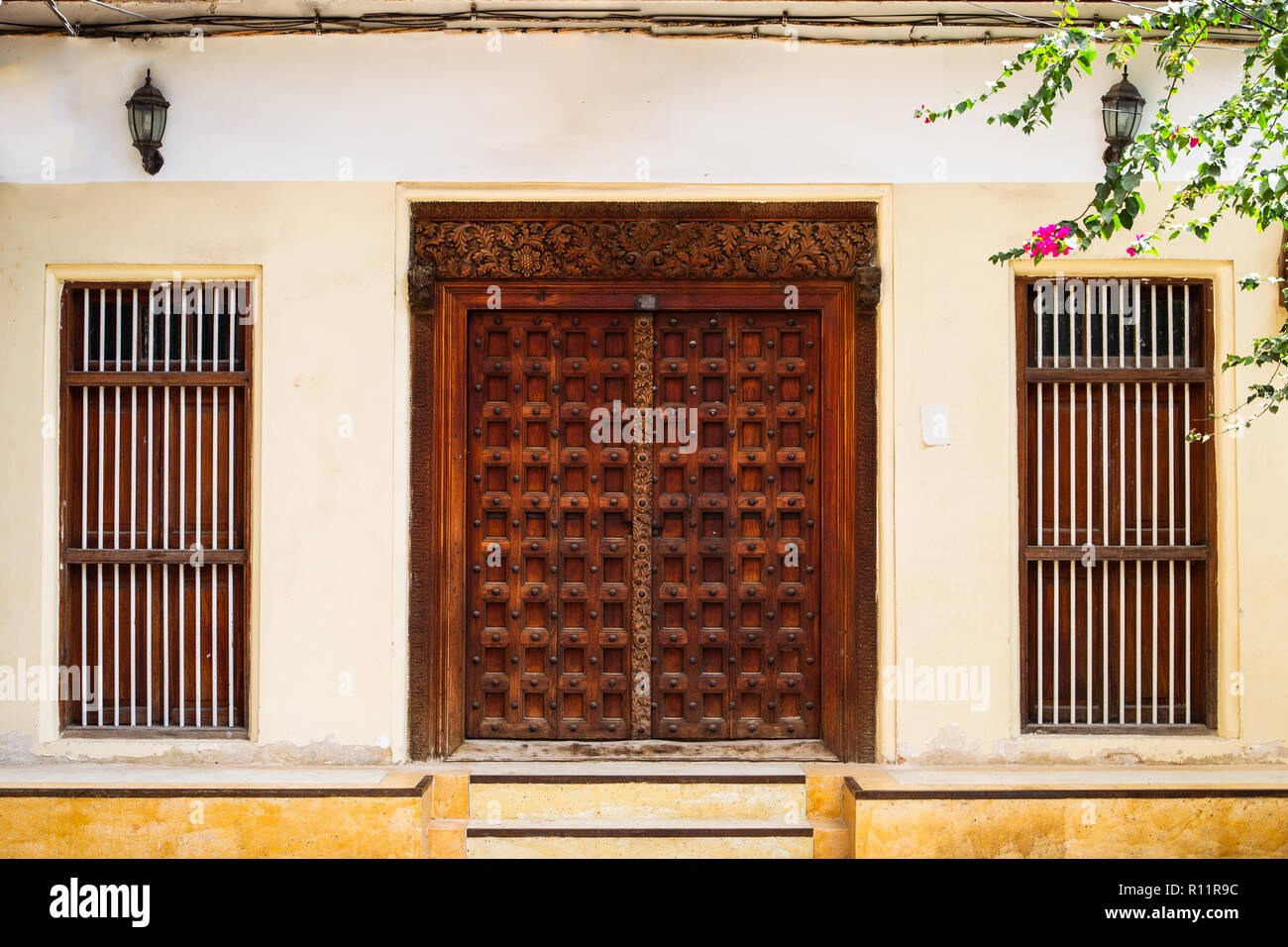 Carved wooden doors of stone town Stock Photo - Alamy