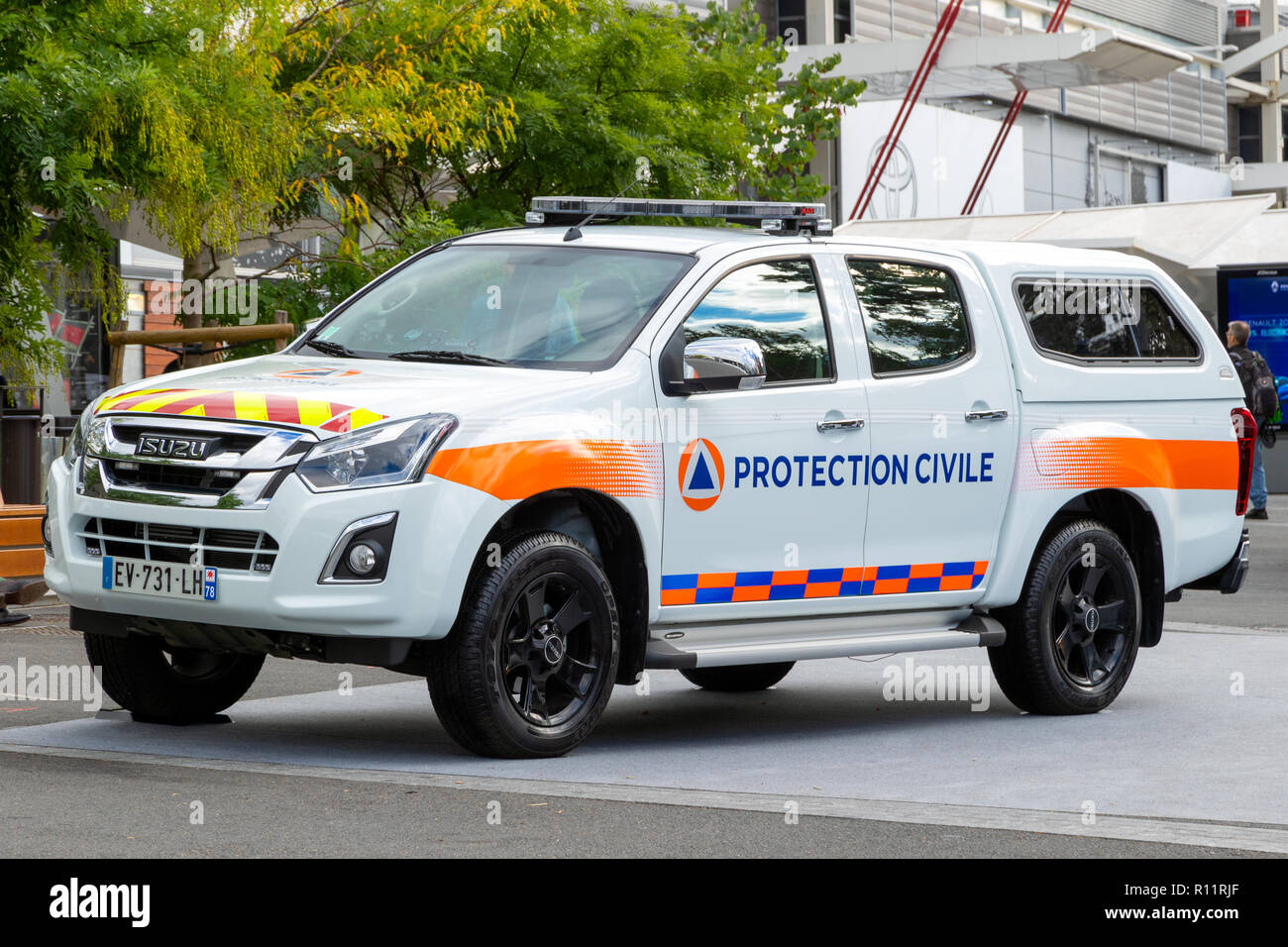 PARIS - OCT 3, 2018: French Securite Civile (Civil Defence Agency) Isuzu pickup truck standing guard at the Paris Motor Show. Stock Photo