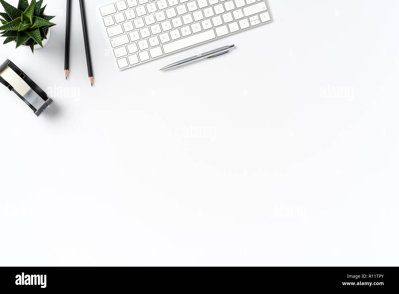 Overhead shot of office desktop Stock Photo - Alamy