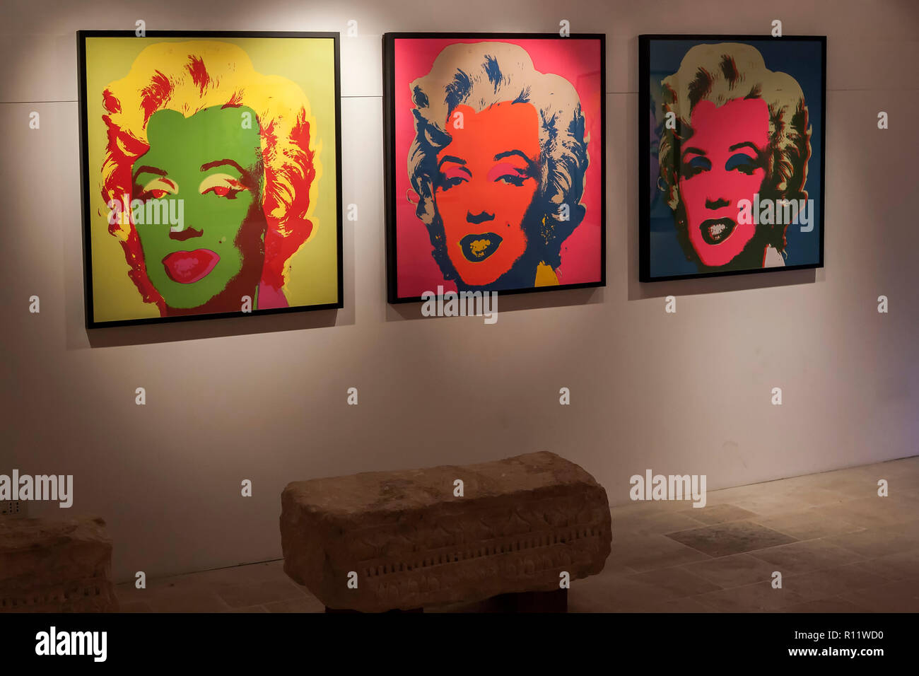 Andy Warhol exhibition, 'I Want to Be a Machine', in the Castello Aragonese, Otranto, Italy: three screenprints of Marilyn Monroe Stock Photo