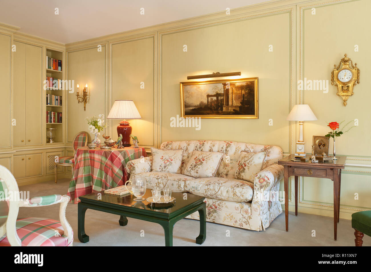 Edwardian living room with floral sofa Stock Photo