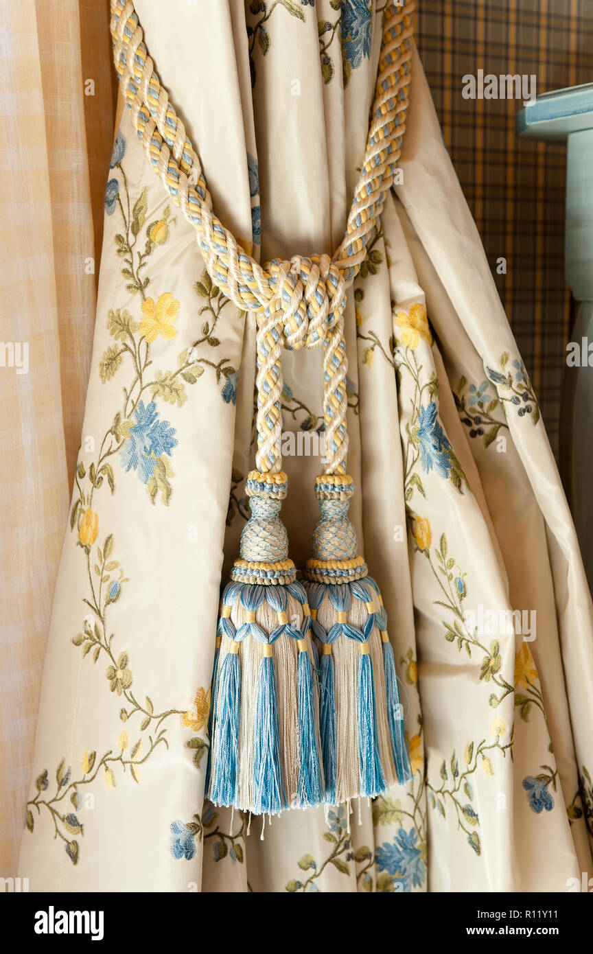 Floral tieback curtain Stock Photo