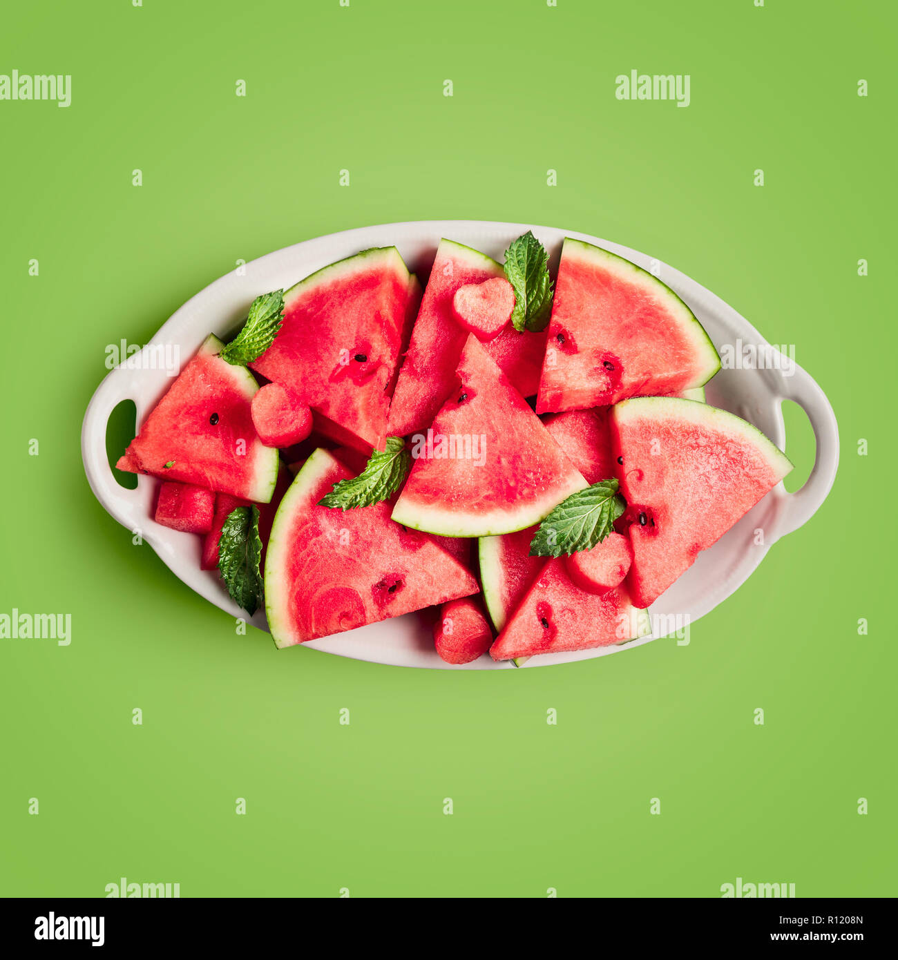 Sliced watermelon berry, fresh fruit on plate. Single object isolated ...