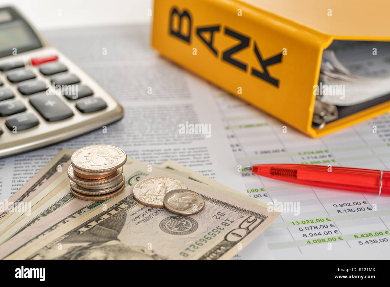 Money with calculator and account statements Stock Photo