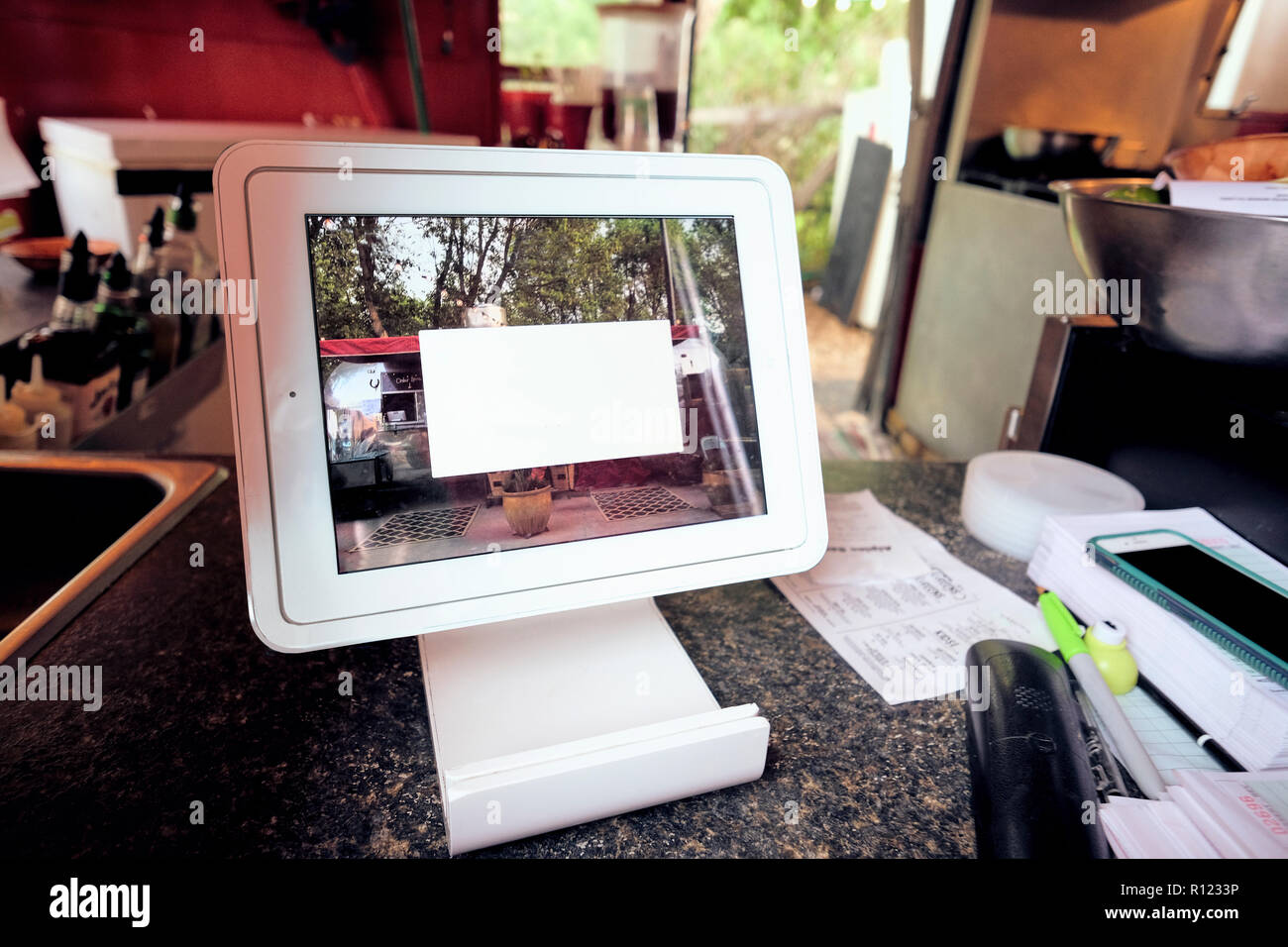 Digital screen for food orders and payment at eatery Stock Photo
