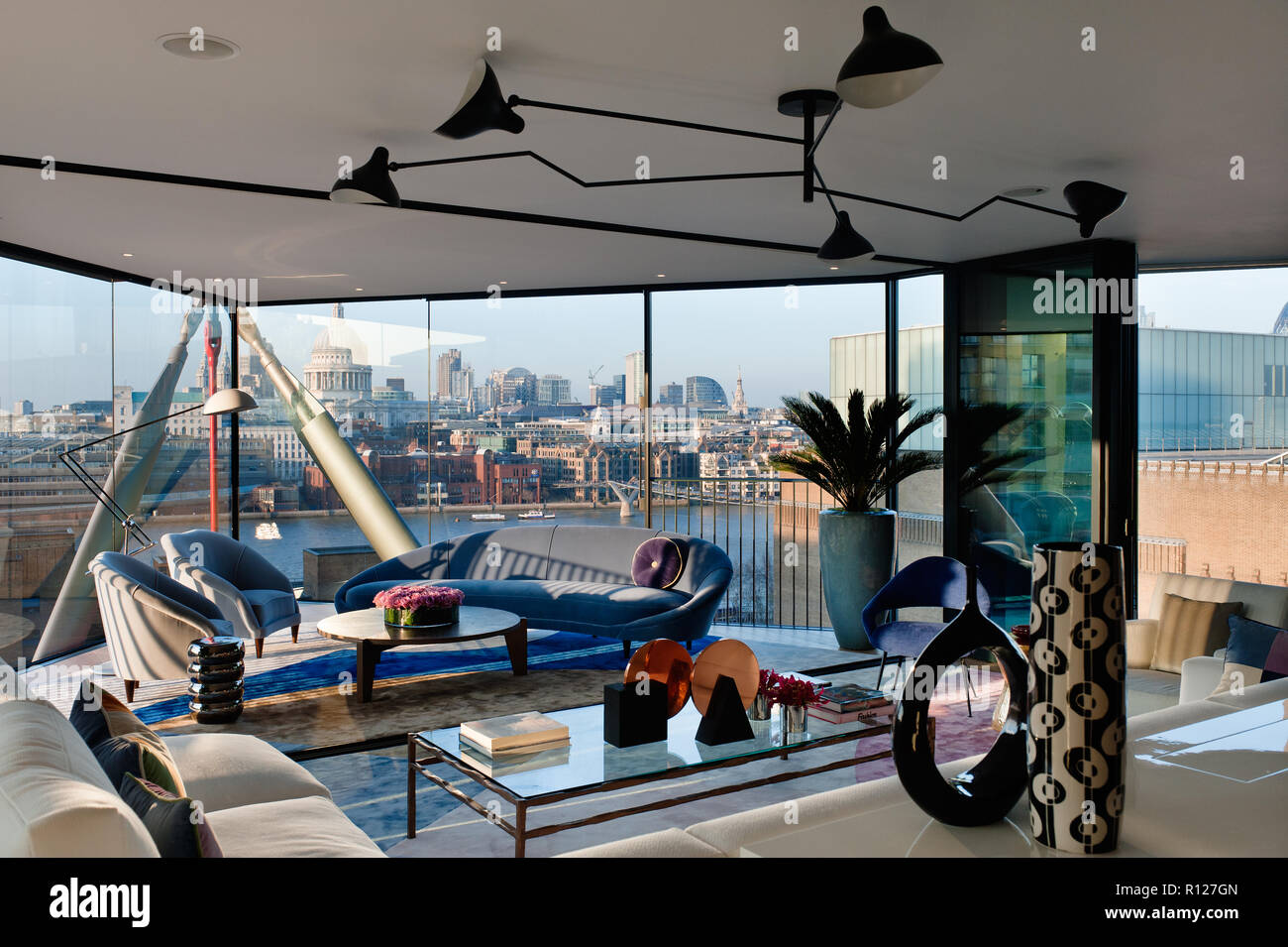 Modern living room in apartment Stock Photo - Alamy