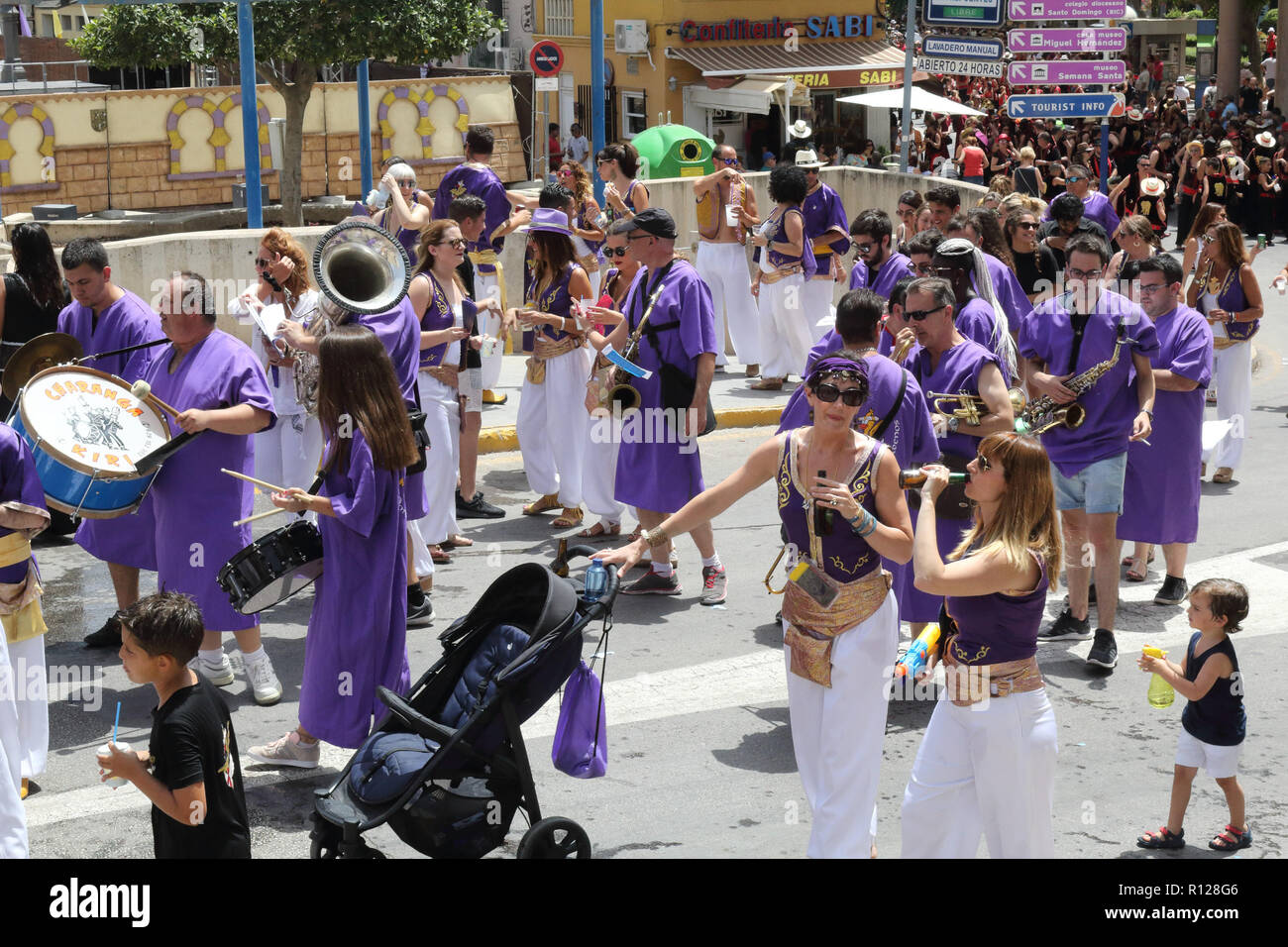 The Moros Almohabenos company band on a street parade during the Moors and Christians (Moros y Cristianos) historical reenactment in Orihuela, Spain Stock Photo
