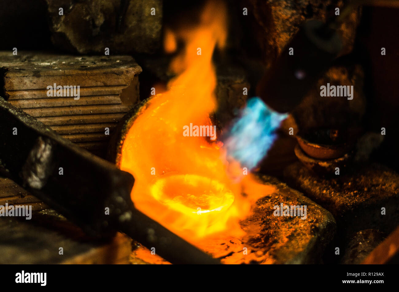 A melted silver in a jewelry melting silver Stock Photo Alamy