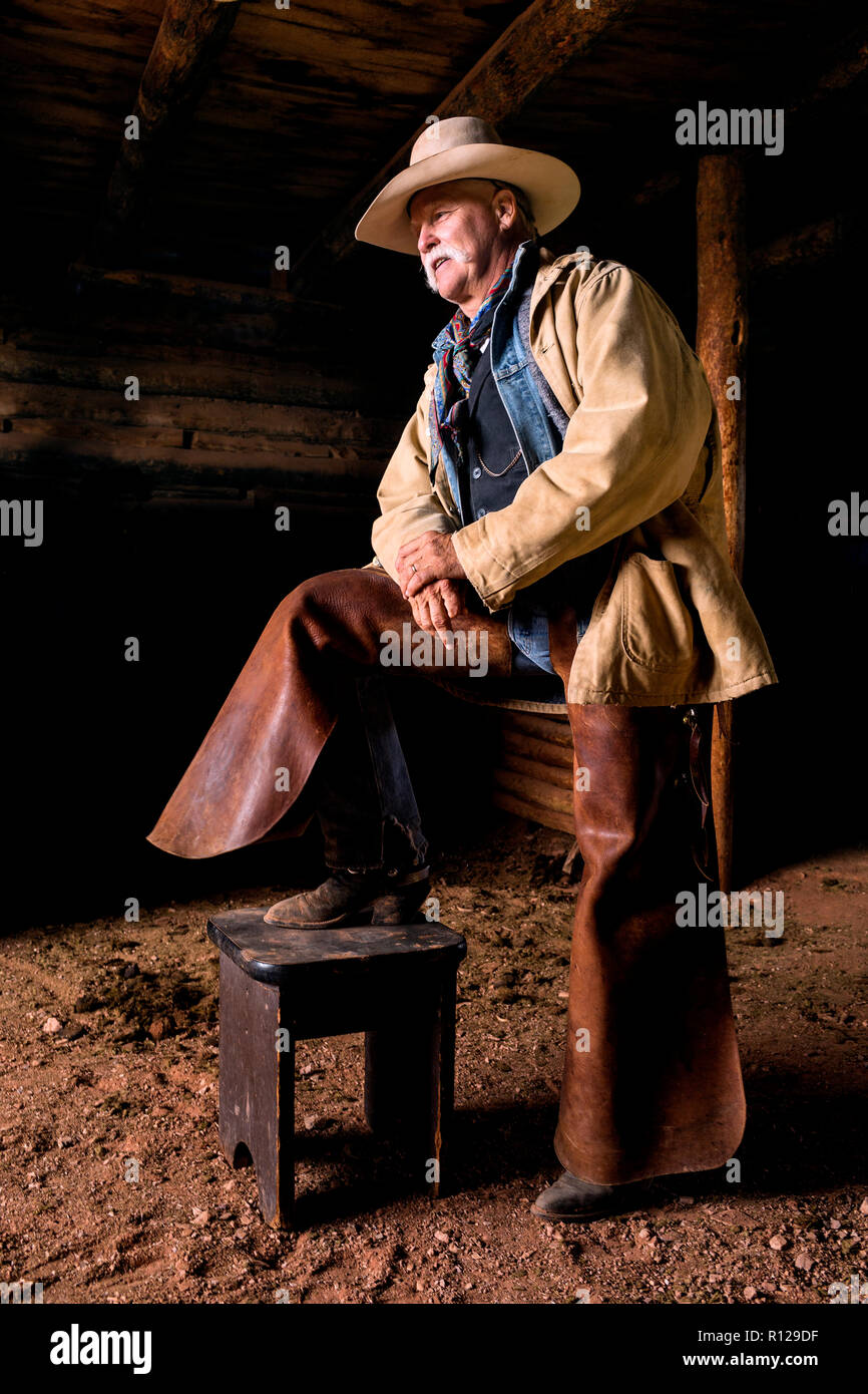 WY02429-00....WYOMING - Mike Buckich in the barn at the Willow Creek Ranch. MR# B18 Stock Photo