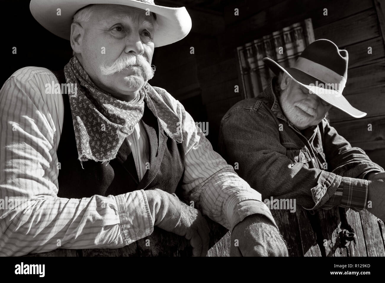 WY0245401...WYOMING Ranch hands Mike Buckich and Clint Black on the