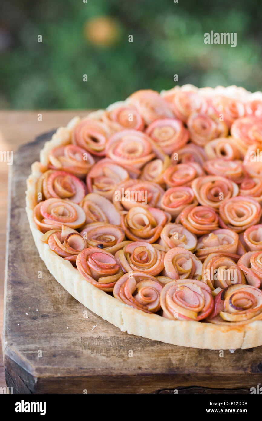 Pie crust filled with apple peel roses Stock Photo Alamy