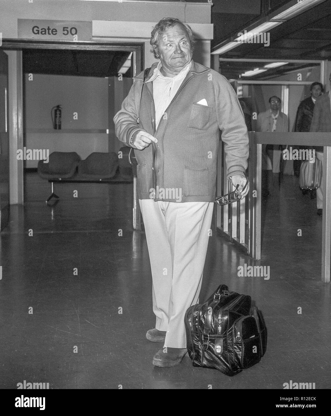 Sir Harry Secombe and his wife Myra leaving Heathrow after losing weight in 1979 Stock Photo