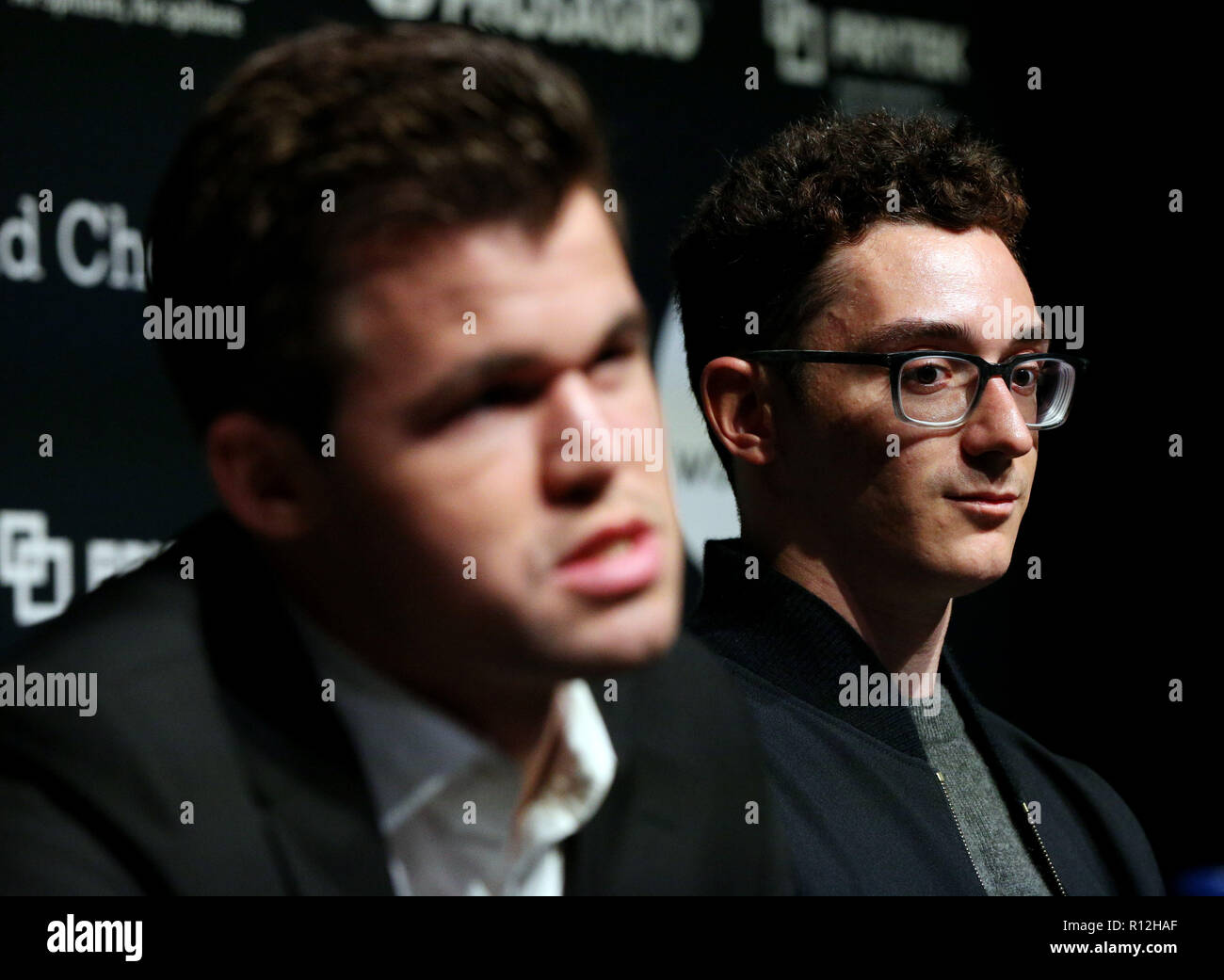 Reigning FIDE world chess champion Magnus Carlsen (right), defends his  title against US challenger Fabiano Caruana, during the first game of the  FIDE World Chess Championship at The College, Southampton Row in