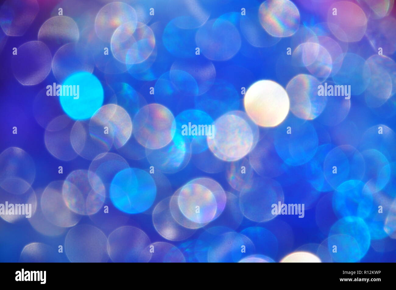 Abstract blue and colorful circles floating in the celebration city night Stock Photo