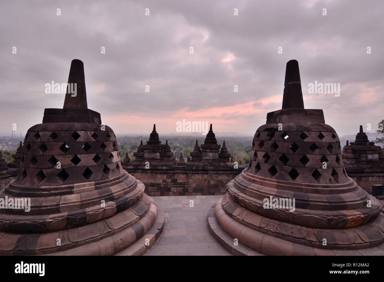 Cloudy sunrise at Candi Borobudur. Magelang. Central Java. Indonesia Stock Photo