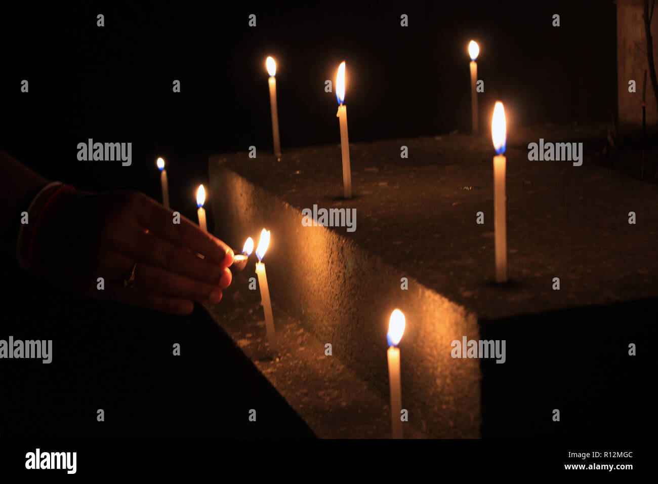 Candles on isolated black background. Flame candles lamps for the ...