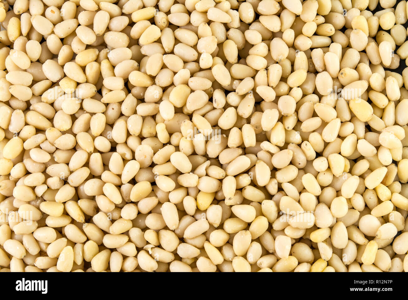 pine nuts, pinenuts background Stock Photo