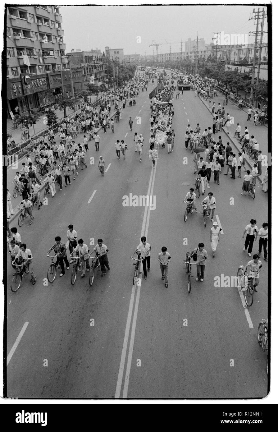 China Shanghai a few days after the massacre in Tiananmen Square in June 1989. Scans made in 2018 Students march through the centre of Shabghai in protest at the deaths of their fellow students in Beijing a few days earlier Stock Photo