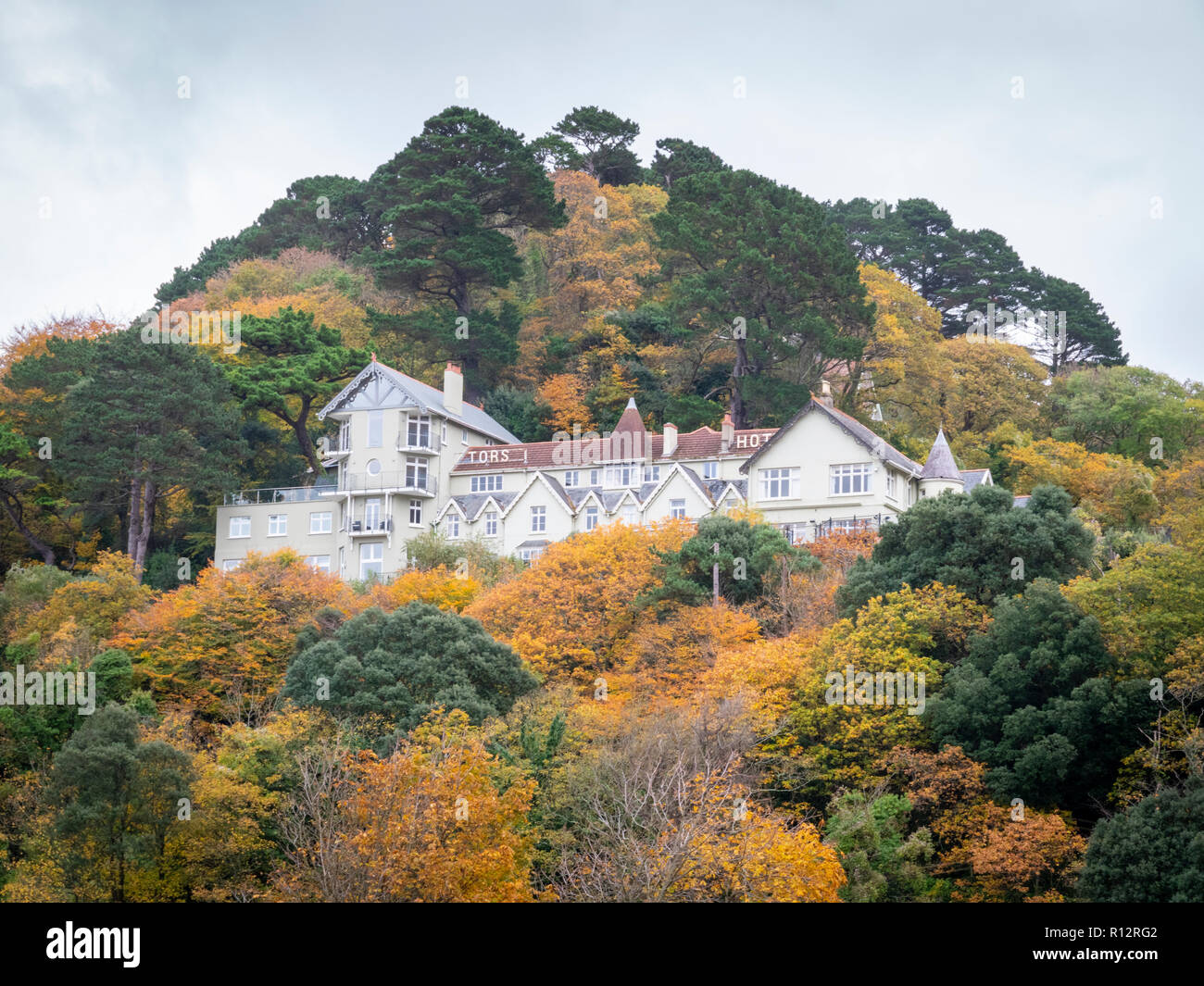 The Tors Hotel on the steep valley sides at Lynmouth Devon UK in autumn Stock Photo