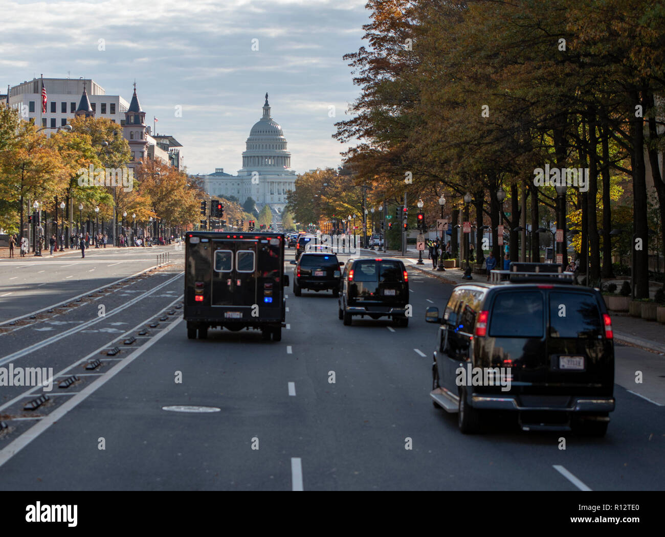 The presidential motorcade with United States President Donald J. Trump and First lady Melania Trump aboard, makes its way up Pennsylvania Avenue to the Supreme Court of the US in Washington, DC for the investiture of Associate Justice of the Supreme Court Brett Kavanaugh on Thursday, November 8, 2018. Credit: Ron Sachs/Pool via CNP /MediaPunch Stock Photo