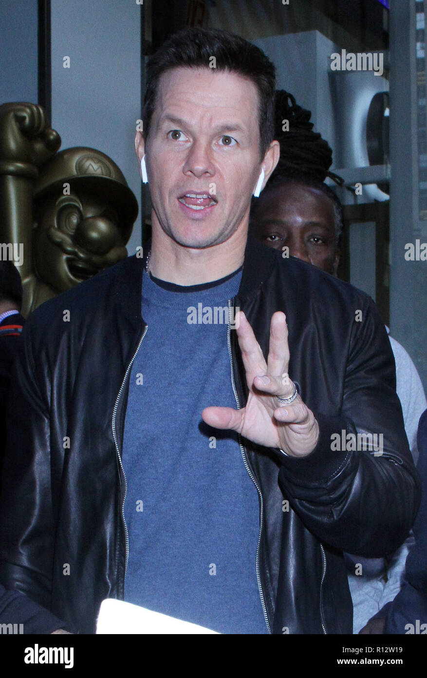 New York, NY, USA. 08th Nov, 2018. Mark Wahlberg seen wearing Apple AirPods  on his way to NBC's Today Show promoting his new movie Instant Family on  November 08, 2018 in New