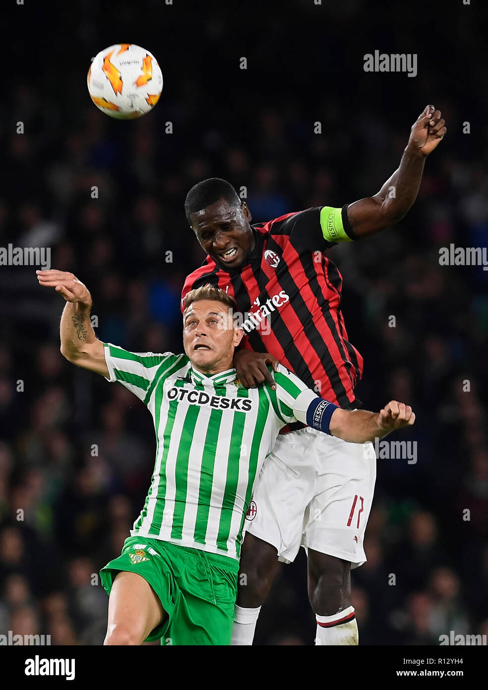 SEVILLE; SPAIN - NOVEMBER 04: Joaquin(L) of Real Betis competes for the ball with Cristian Zapata(R) of Milan in party belonging to phase of groups of UEFA; Europa League; (Group F); facing to the Real Betis v Milan; stadium Benito Villamarin; 08th November; 2018; foto:Cristobal Duenas/Cordon Press Stock Photo
