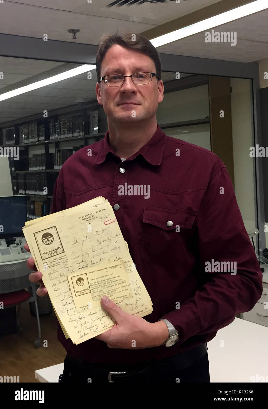 Jerusalem, Israel. 06th Nov, 2018. The German archivist Stefan Litt with a  letter from the estate of the German-speaking author and Kafka publisher  Max Brod in the Jerusalem National Library. In the