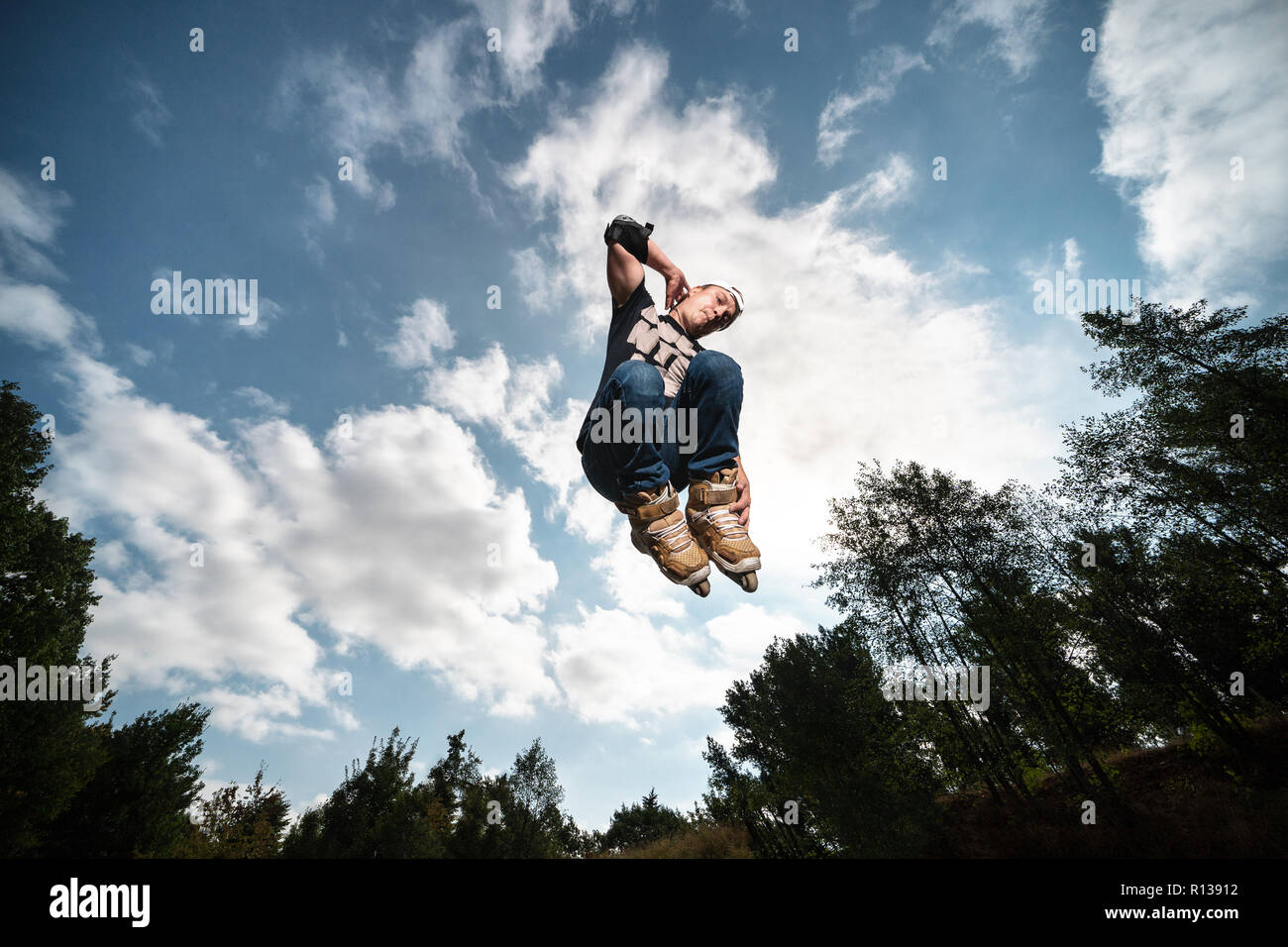 Inline skating jump Stock Photo