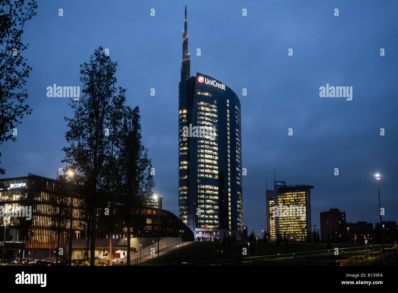 Unicredit Tower headquarter office building at night with  illuminated windows in Porta Nuova, Milan, Italy on November 8, 2018. Stock Photo