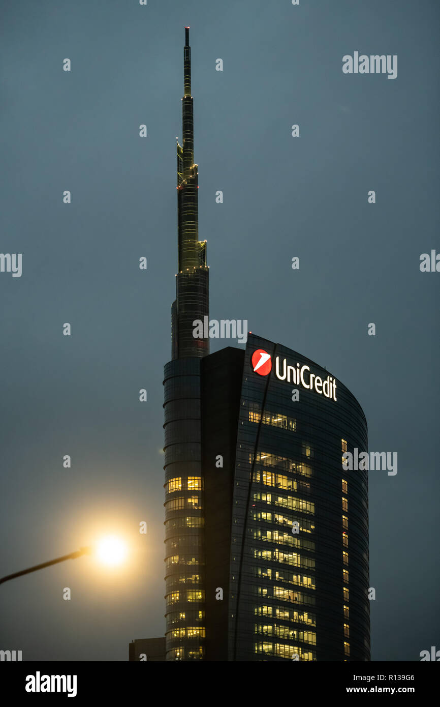 Unicredit Tower headquarter office building at night with  illuminated windows in Porta Nuova, Milan, Italy on November 8, 2018. Stock Photo