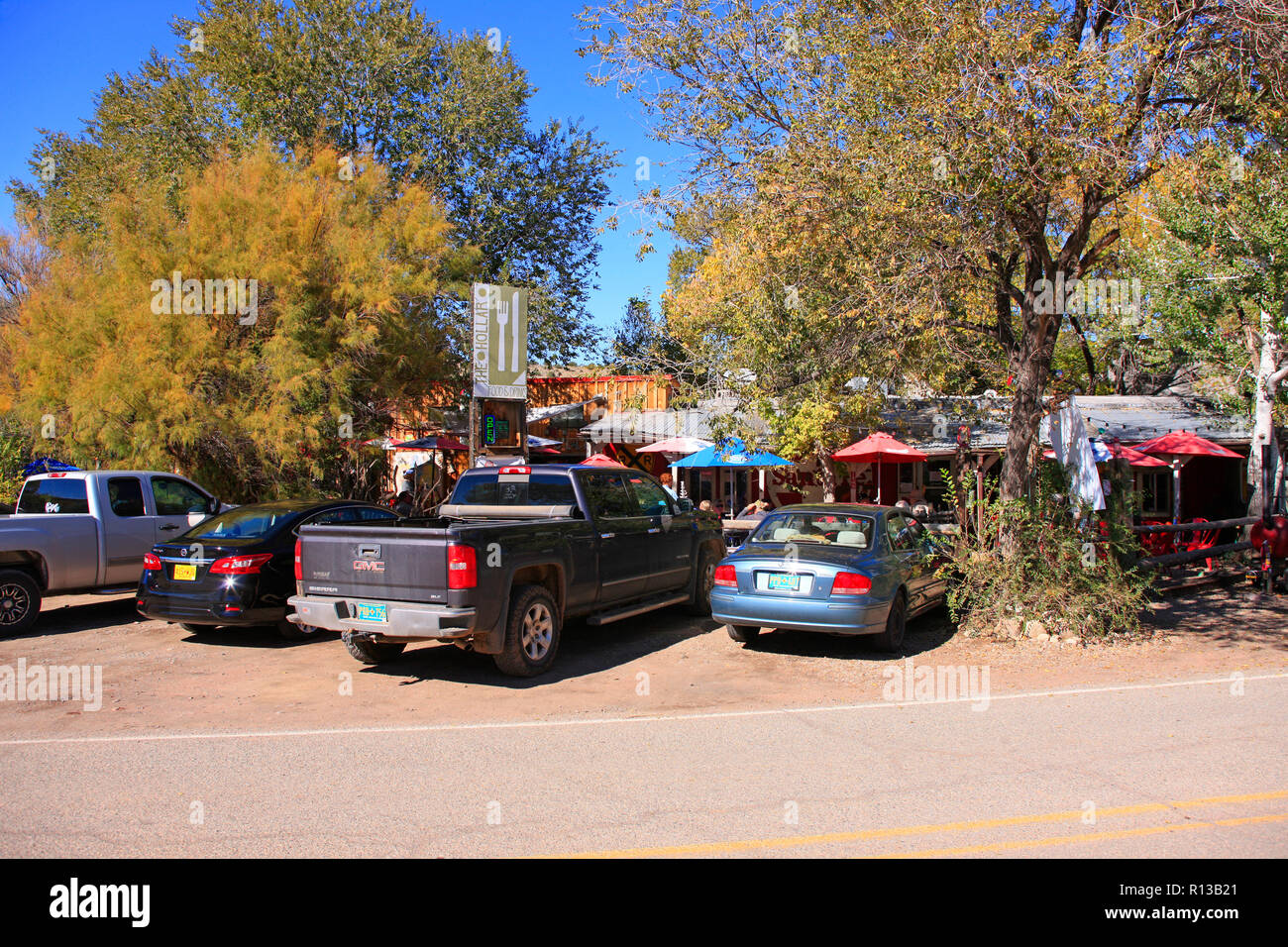 Vehicles parked outside the popular Hollar restaurant in downtown