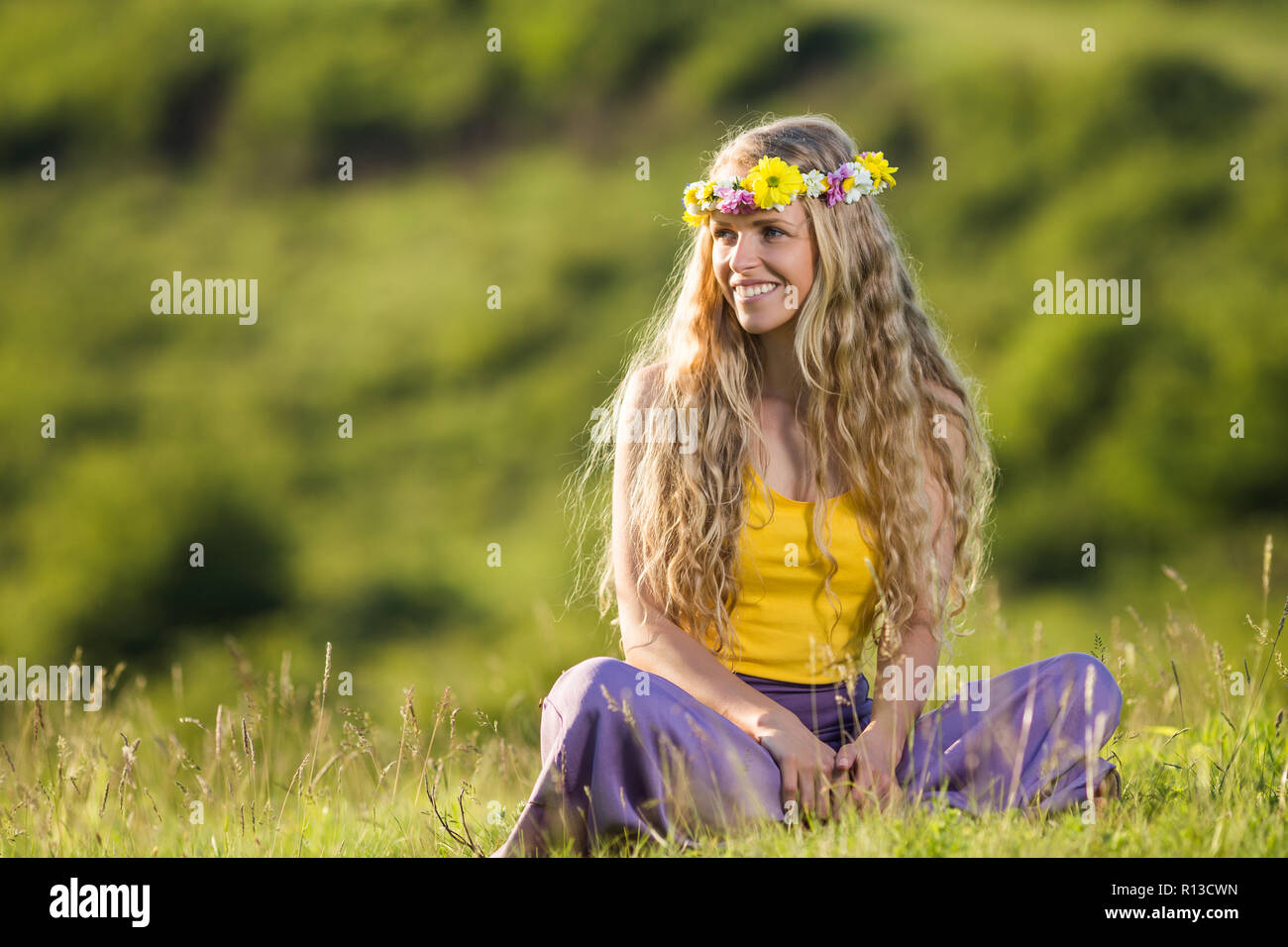 plus Veluddannet låg Beautiful woman with wreath on her blonde hair enjoys in the nature Stock  Photo - Alamy