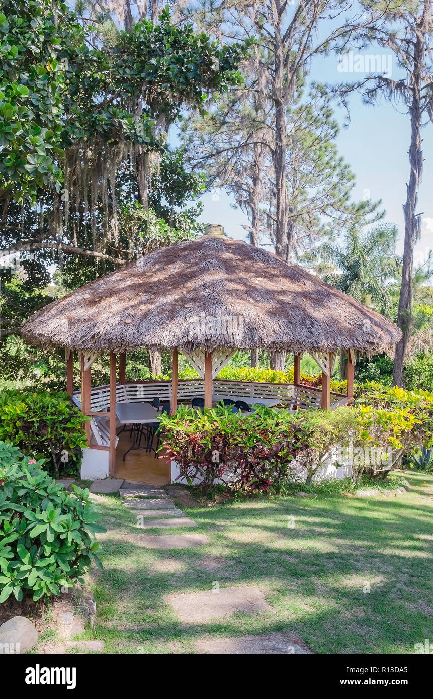 Traditional gazebo roofed in palm tree mountains to enjoy the cool